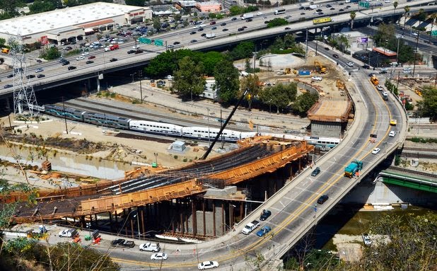 Riverside-Figueroa Bridge construction photo from The Eastsider July 2013. New bridge under construction on the left, historic bridge on the right