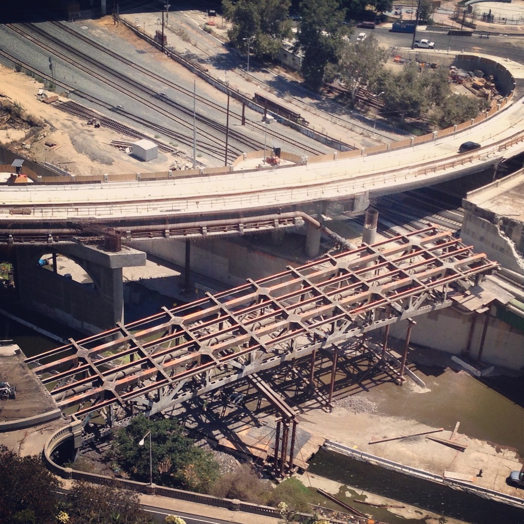 Steel truss frame fully revealed during the demolition of the Riverside-Figueroa Bridge. Photo: Daveed Kapoor