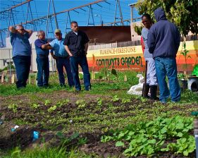 Florence-Firestone residents gather at the community garden for a workshop on Sat., February 11
