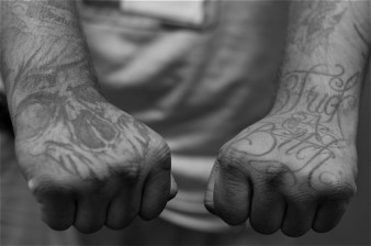 Tattoos - symbols of the struggle of his earlier years - warn you against crossing a former gang member. Sahra Sulaiman/Streetsblog L.A.