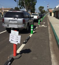 Parking protected bike lane on Artesia Boulevard in the city of Long Beach. Long Beach due to receive funding for a similar facility on Pacific Avenue. Photo by Joe Linton/Streetsblog L.A.