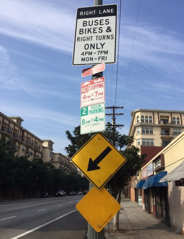 New bus lane signage on Cesar Chavez Avenue near Grand Avenue in downtown L.A. Photo by Joe Linton/Streetsblog L.A.