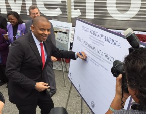 U.S. Transportation Secretary Anthony Foxx signs the ceremonial Full Funding Grant Agreement to extend the Purple Line subway. Photo: Joe Linton/Streetsblog L.A.