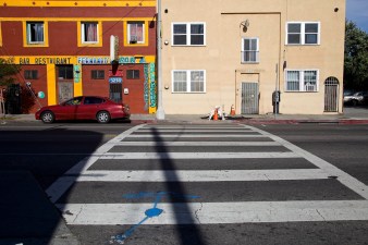 New signals are going in at 33rd and Central, the site of a number of crashes over the years - most recently a horrific hit-and-run that tossed a cyclist into the air like a rag doll. Sahra Sulaiman/Streetsblog L.A.