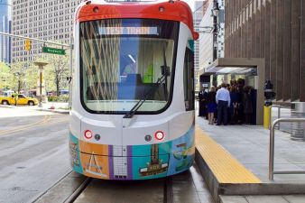 Detroit's 3.3-mile QLINE streetcar, funded in part by a $25 million federal grant, saw ridership drop 40 percent after introducing a $1 fare. Photo: Wikimedia Commons