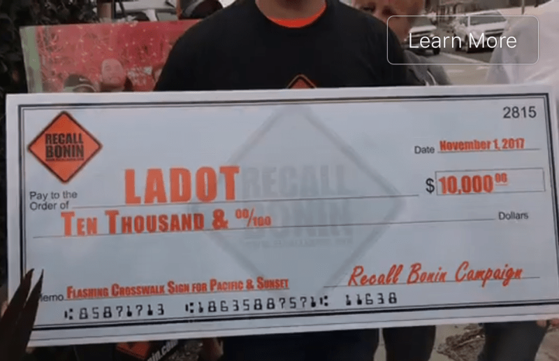 Recall Bonin proponents offered LADOT $10,000 for street safety. Initial campaigns filings show they raised only $41,492 through September 30. Screenshot via Facebook Video