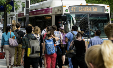 The process of boarding one by one at the front door slows down the Boston bus routes with the most ridership. Photo: LivableStreets Alliance