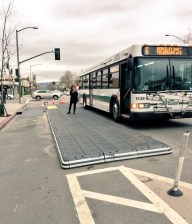Oakland built a bus stop platform on Telegraph Avenue using modular plastic components. Photo: TransitCenter
