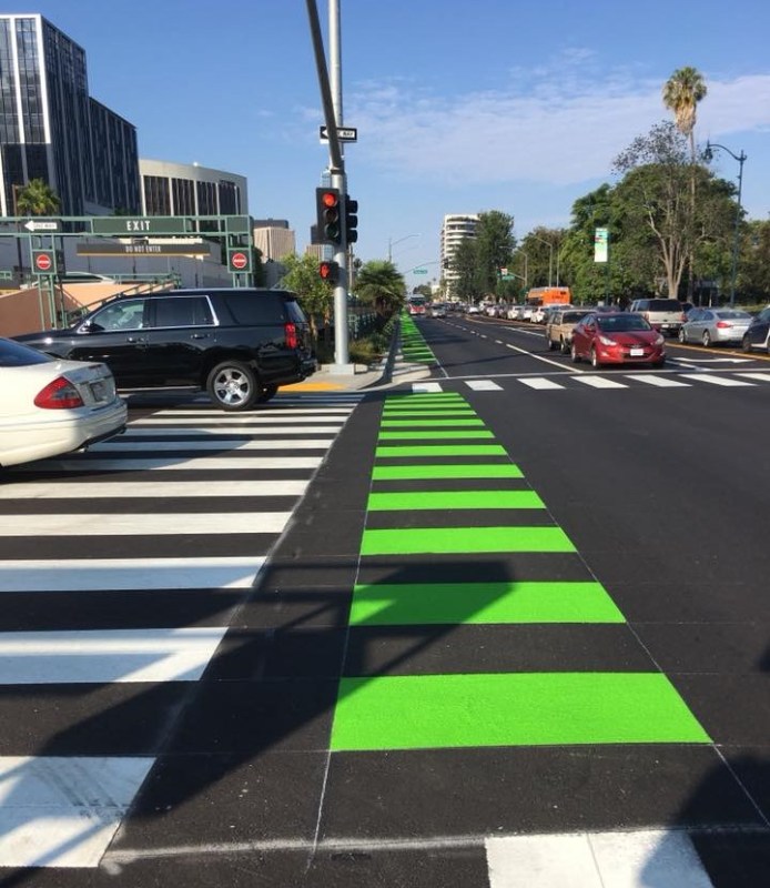 Green striping on Santa Monica Boulevard in Beverly Hills. Photo via Joshua Paget