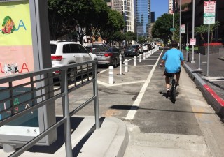 L.A.'s MyFigueroa project is open.  Features include protected bike lanes and transit islands. Photos by Joe Linton/Streetsblog L.A.