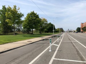 A Detroit media bigwig is complaining about traffic on this street, East Jefferson. The city recently added a protected bike lane. Photo: Streetsblog