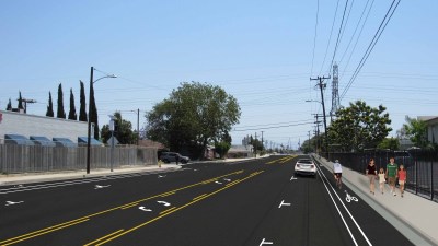 County officials are in the works to reduce the number of lanes in a four-mile stretch of Hazard Avenue in North Orange County. The new configuration would reduce the mostly four-lane street to three, which would include one lane going east and west, a middle turn lane and a parking protected bike lane. Image: Orange County Public Works