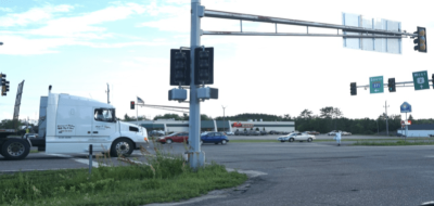 A woman tries to cross a rural highway near Minnesota tribal lands. Photo: Guillermo Narvaez