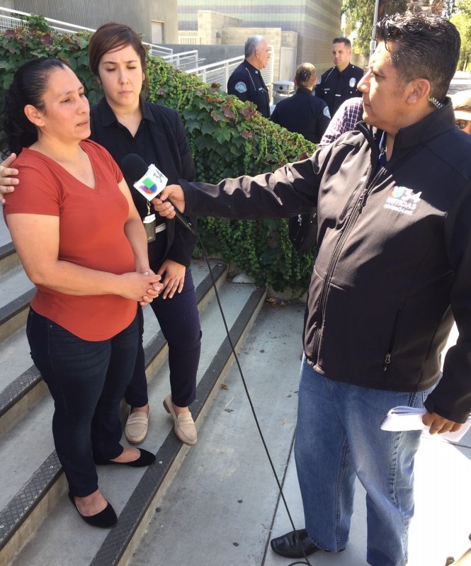 Widow of hit-and-run victim Francisco Hernandez Rivas being interviewed this morning. Photos by Joe Linton/Streetsblog L.A.