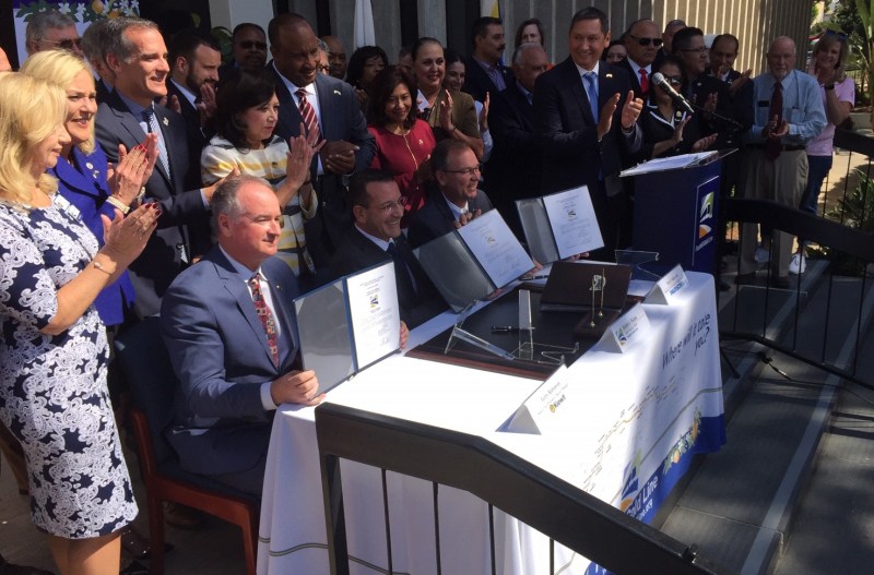 Gold Line Authority and Kiewit-Parsons representatives showing their signed notices to proceed with Gold Line construction. Photos by Joe Linton/Streetsblog L.A.