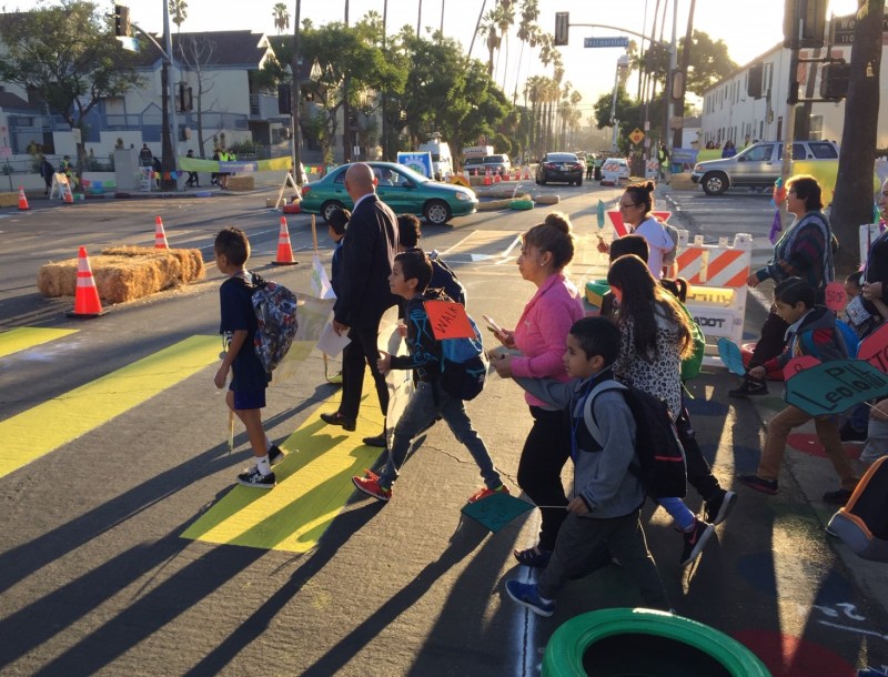 Leo Politi students and families walking along pop-up safety improvements on today's National Walk to School Day. Photos by Joe Linton/Streetsblog L.A. except where credited otherwise