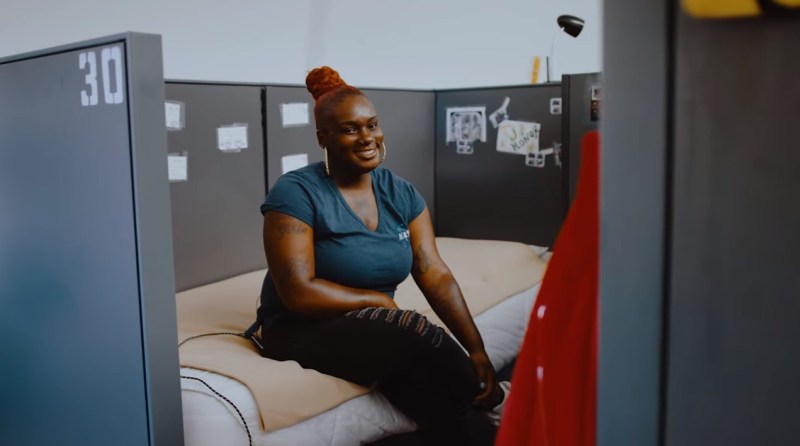 Crystal on her bed at A Bridge Home Imperial - from Everyone In video