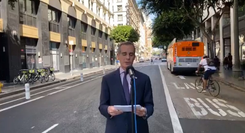 Mayor Garcetti opening the new bus and bike lanes on 5th and 6th Streets. Image via Facebook Live