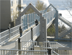 Projects like this pedestrian bridge aren't really about making the world better for walkers, Cortright argues. They're about avoiding any inconvenience for drivers. Photo: Rails-to-Trails Conservancy