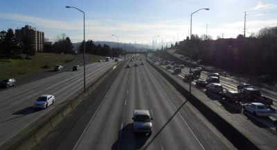 I-5 is wide concrete chasm between Wallingford and the U District, as seen from 45th St bridge. (Photo by author)