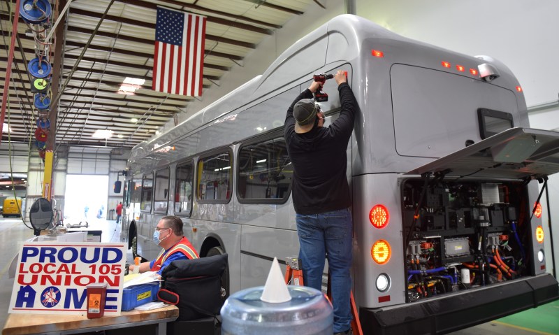 BYD SMART Local 105 union employees assemble a Metro electric bus in Lancaster. Photo by BYD