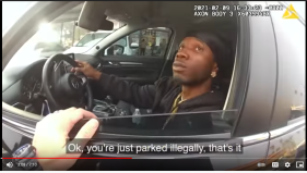 The February 9 encounter near Manchester and Figueroa began with officers telling Travis Elster he was illegally parked in a private parking lot, but the placement of the officer's hand inside the vehicle was one of several forms of escalation. Elster ultimately fled the scene and was shot at eight times by LAPD officer Carlos Tovar. Tovar managed to hit Elster's vehicle as well as the vehicle of a passing Lyft driver, but thankfully no one was injured. Screenshot from the critical incident video released by LAPD.