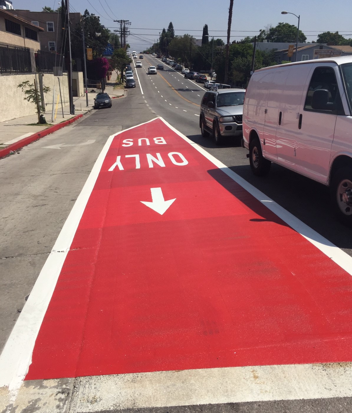 Red bus lane on Alvarado Street just north of Beverly Boulevard.