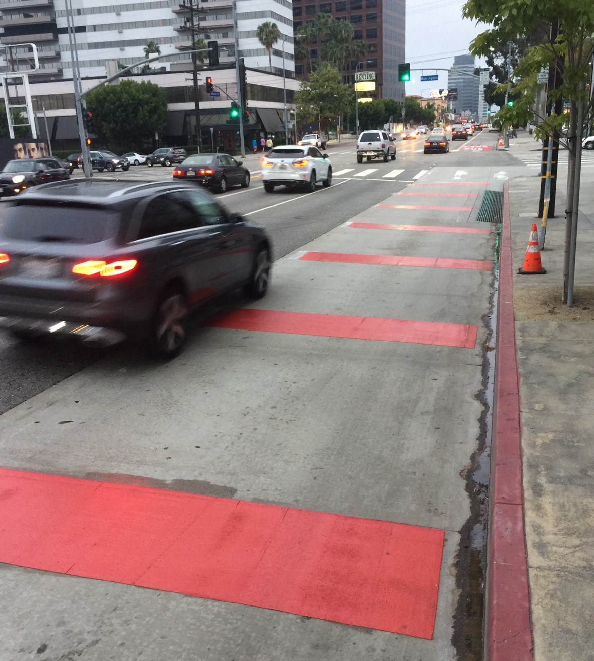 Red striped areas are shared by buses and right turning vehicles