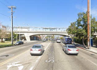 LADOT says La Brea at Expo is "width-challenged" - and that current project plans do not include approved bus lanes as  it would compromise the objective of the complete streets project. Image via Google Street View