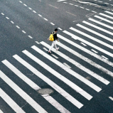 Even the best crosswalk highlights just how much of the rest of the road has been given over to drivers — and how profoundly automobility has infected global culture itself. Image: Piqsels, CC