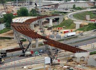 The federal government funds road construction like the above at four times the amount that it spends on transit. Photo: file